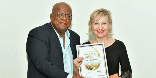 Prof Jonathan Jansen awards Wits Prof Glenda Gray the ASSAf Science for Society Gold Medal